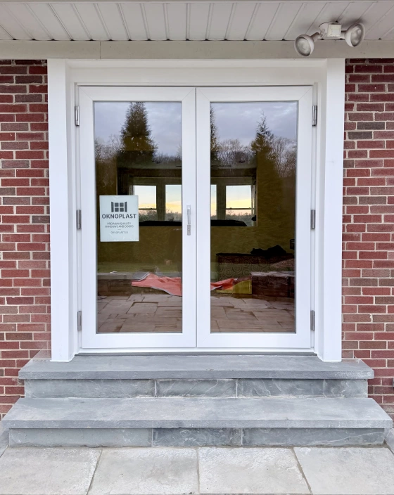 From Window to Elegant Oknoplast French Doors project photo.