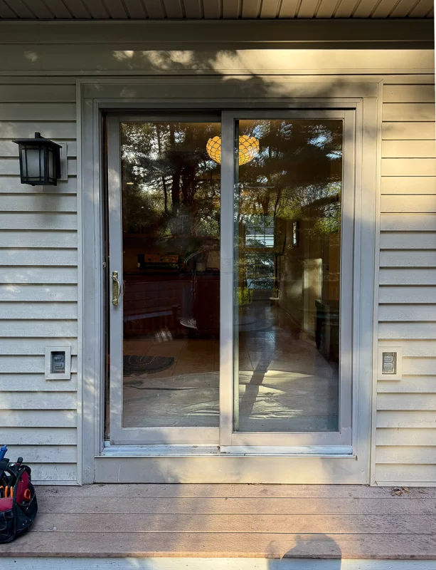 Patio Door Replacement and Wall Dog Door Installation gallery photo.