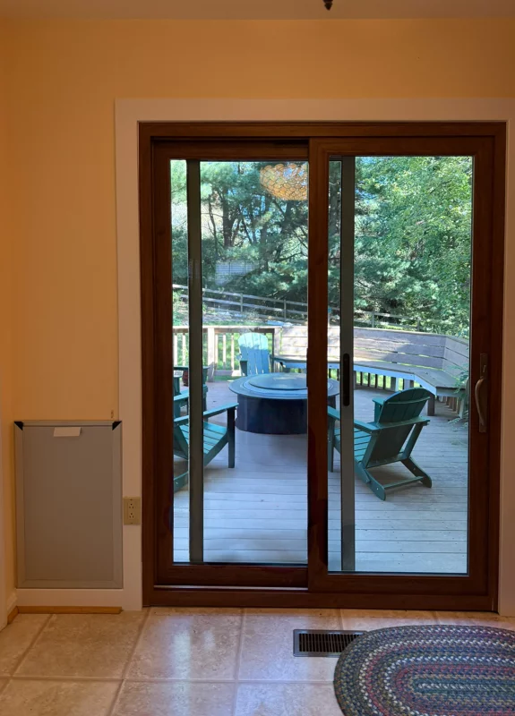Patio Door Replacement and Wall Dog Door Installation gallery photo.