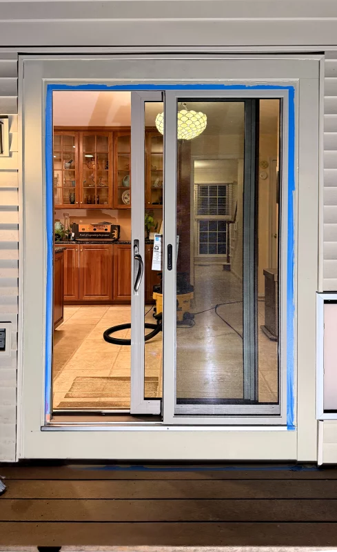 Patio Door Replacement and Wall Dog Door Installation gallery photo.