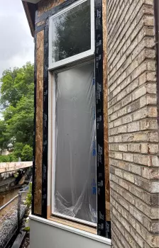 Full Exterior Trim Replacement Around Bay Window project photo.