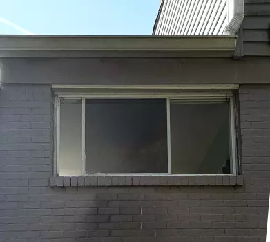 Slider Window and Storm Door Installation project photo.