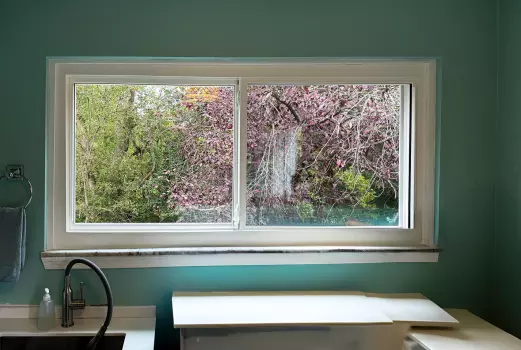 Slider Window and Storm Door Installation project photo.