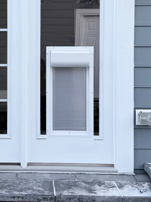 French Door Upgrade with Pet Door Installation gallery photo.