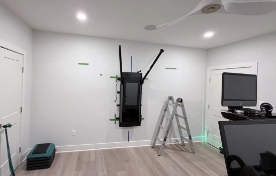 Mirror Installation for Home Gym project photo.