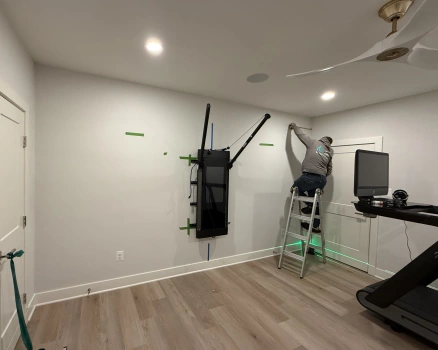 Mirror Installation for Home Gym project photo.
