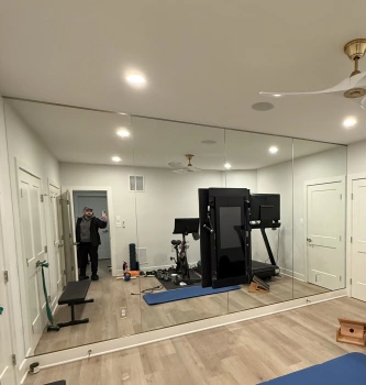 Mirror Installation for Home Gym project photo.