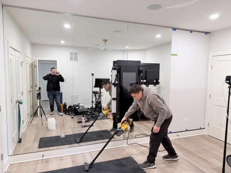 Mirror Installation for Home Gym project photo.