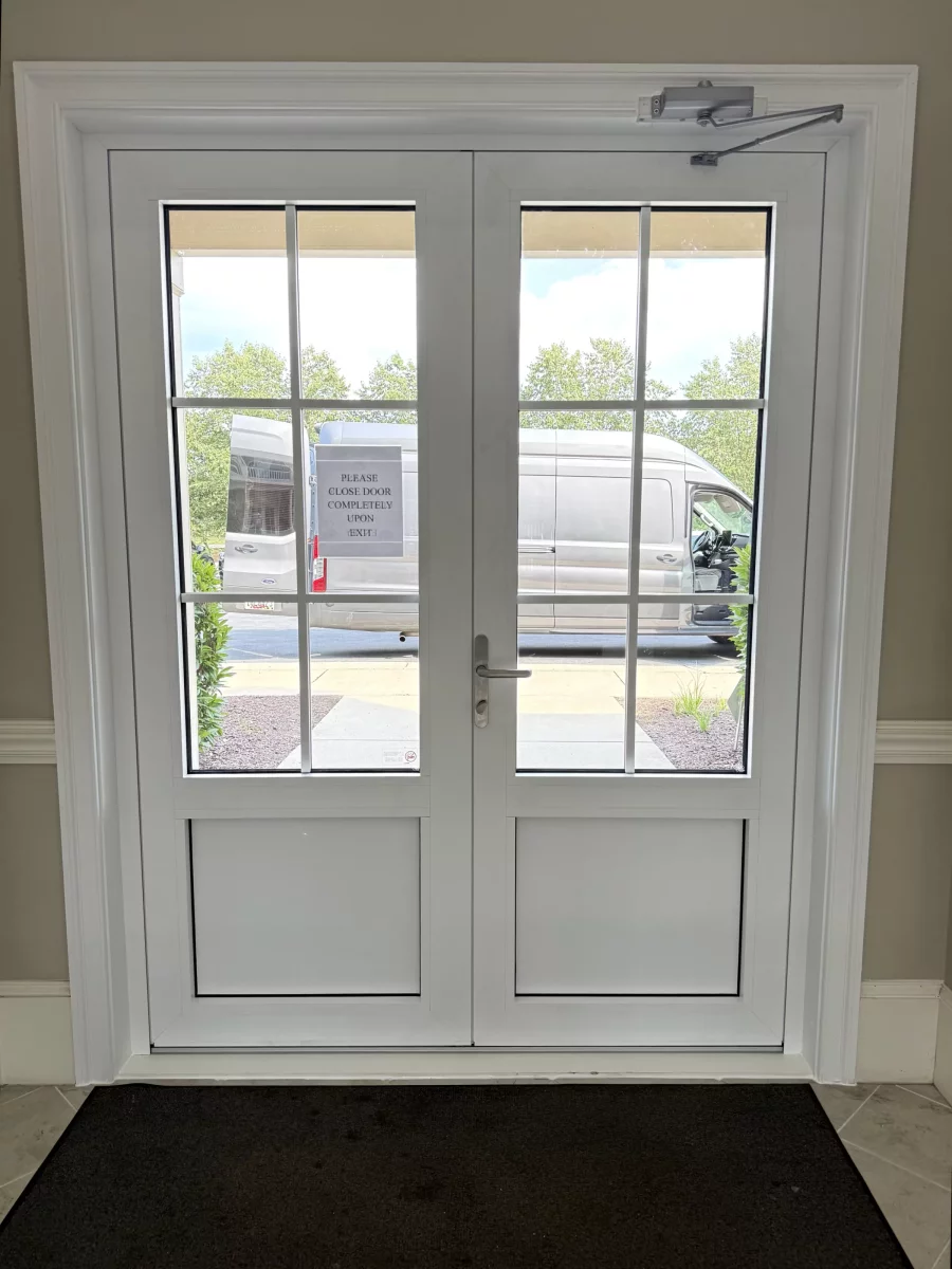 White double glass door with metal handle and exterior view
