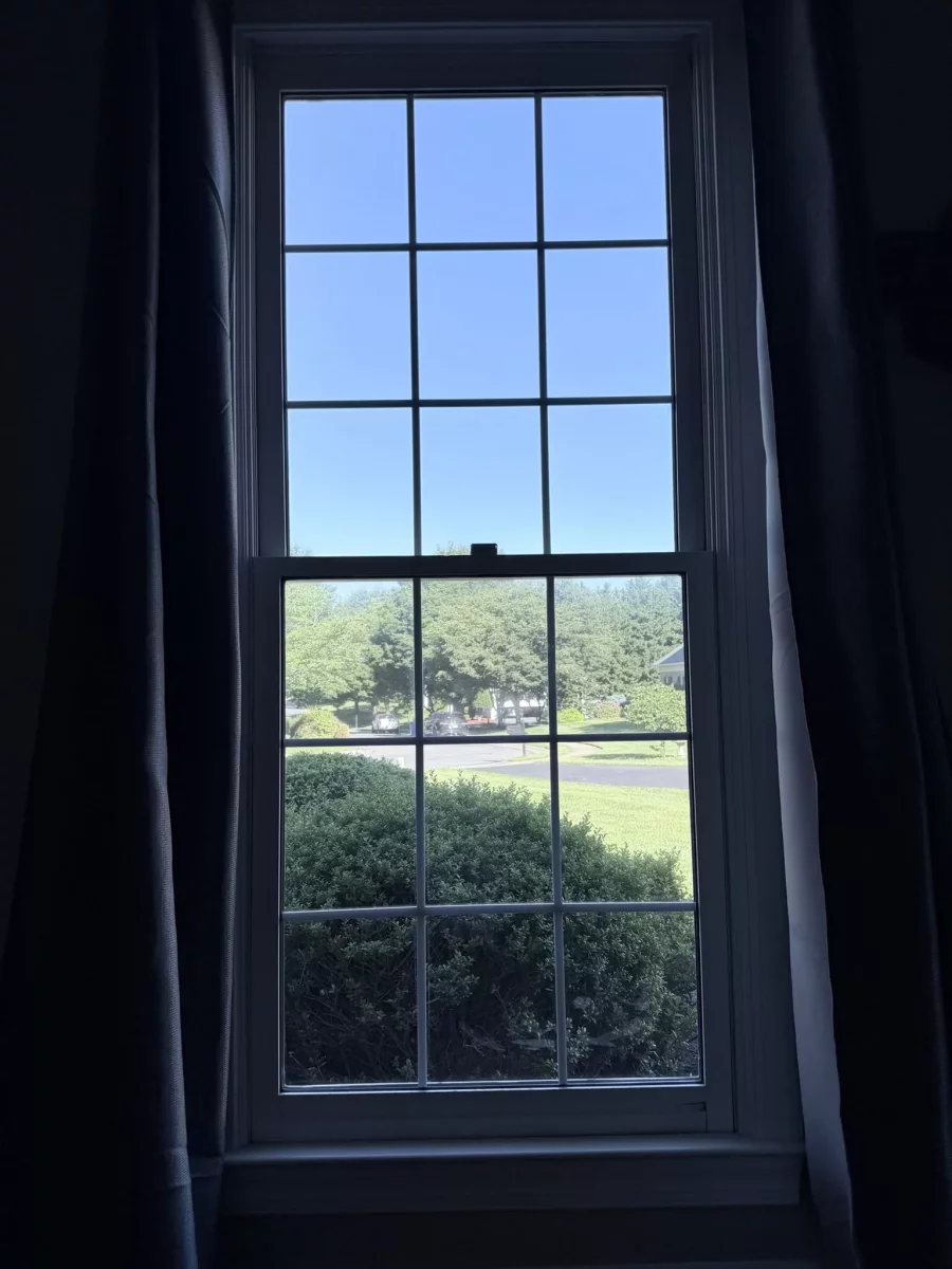 Double-hung window with grid pattern viewed from inside
