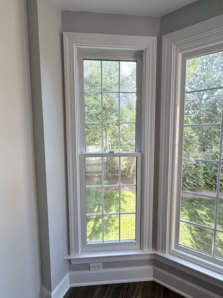 Double-hung window with white trim in a residential interior