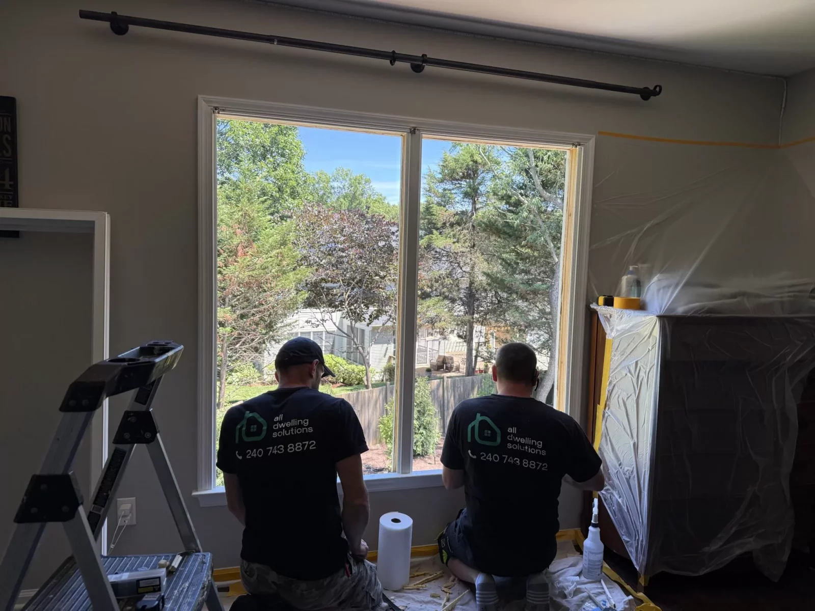 Professional window replacement in progress in Rockville, MD, showing installers completing an energy-efficient window installation.