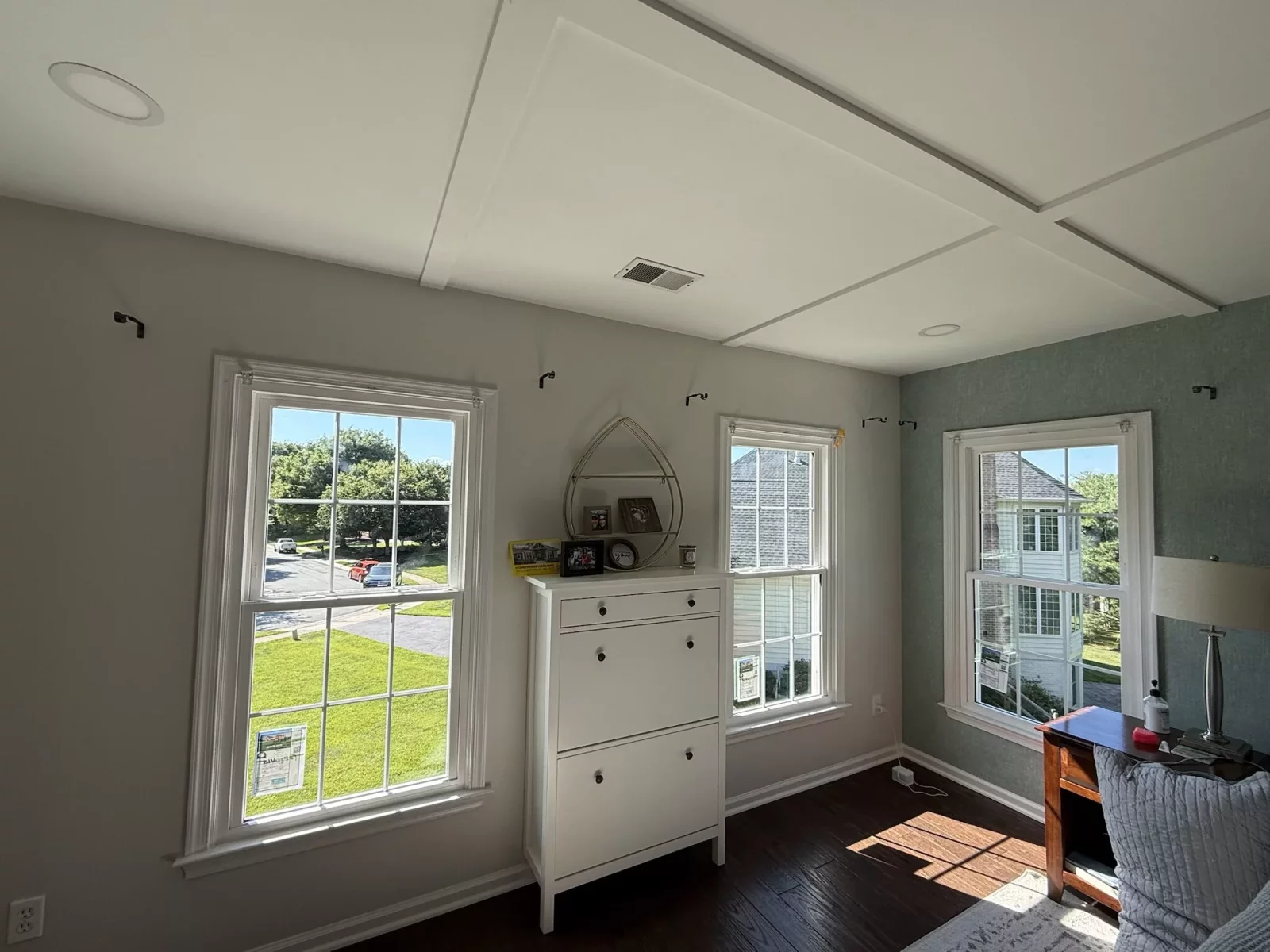 Completed whole-home window replacement in Rockville, MD, featuring new energy-efficient double-hung windows with grids.