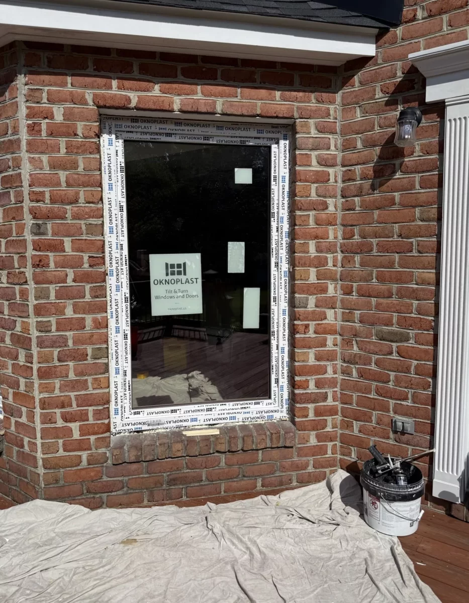 Oknoplast tilt-and-turn window installation showing professional frame leveling and securing in Monrovia, Maryland