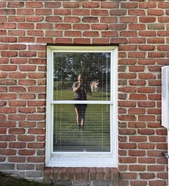 Before Oknoplast tilt-and-turn window replacement showing the original double-hung window in Monrovia, Maryland