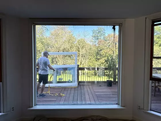 Oknoplast tilt-and-turn window installation in progress with the original window ready to be removed in Monrovia, Maryland