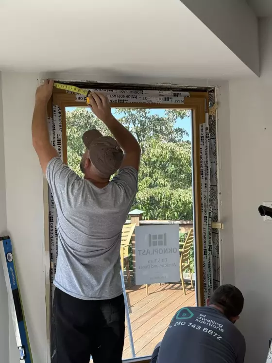 Oknoplast tilt-and-turn window installation with precise measuring and frame alignment in Monrovia, Maryland