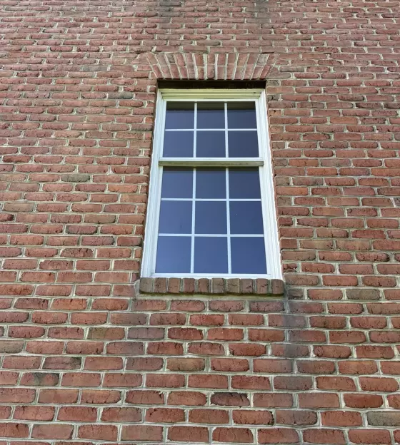 Old rotted Andersen window before full-frame replacement with a new Marvin Elevate window in Monrovia, Maryland