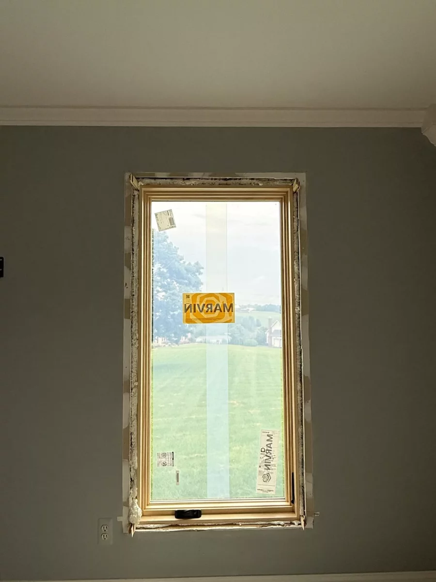 New window partially installed in interior wall